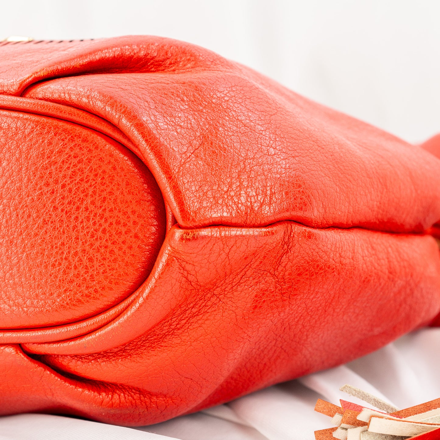 Vincis Bench | Red Leather Drawstring Bag